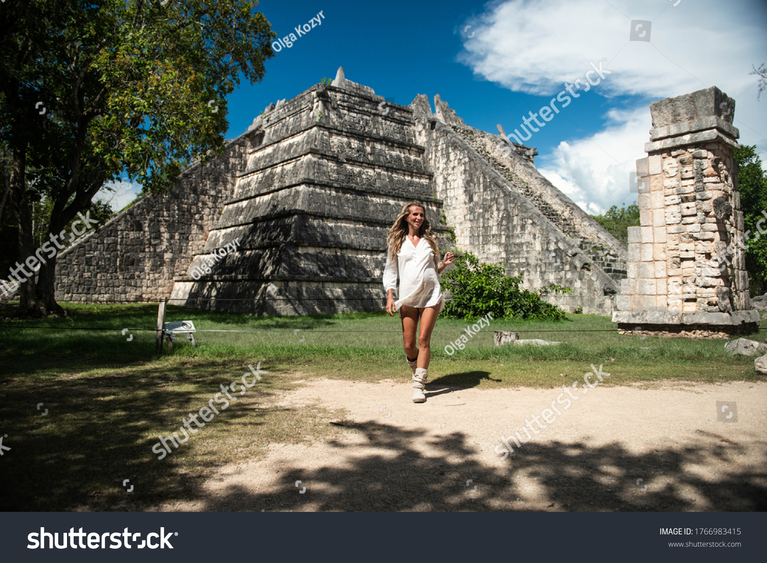 Pregnant woman in Chichen Itza. Mayan pyramid in Yucatan, Mexico. Travel concept.
