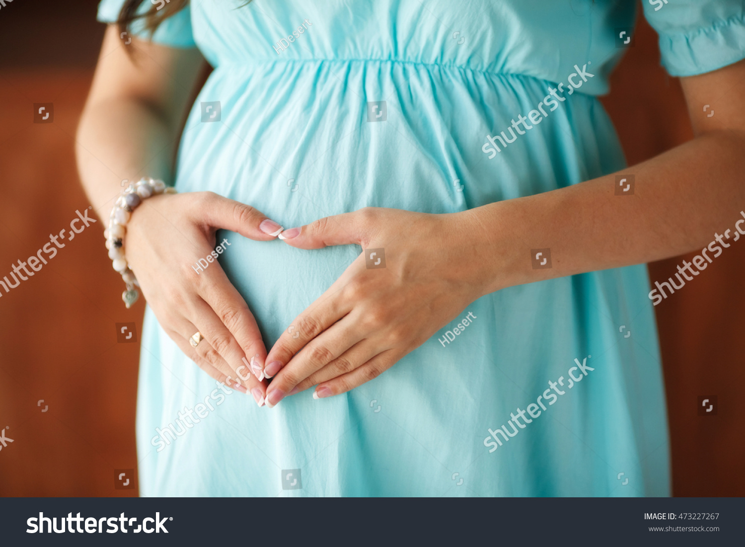 Pregnant Woman Touching Her Belly With Hands Stock Photo Shutterstock