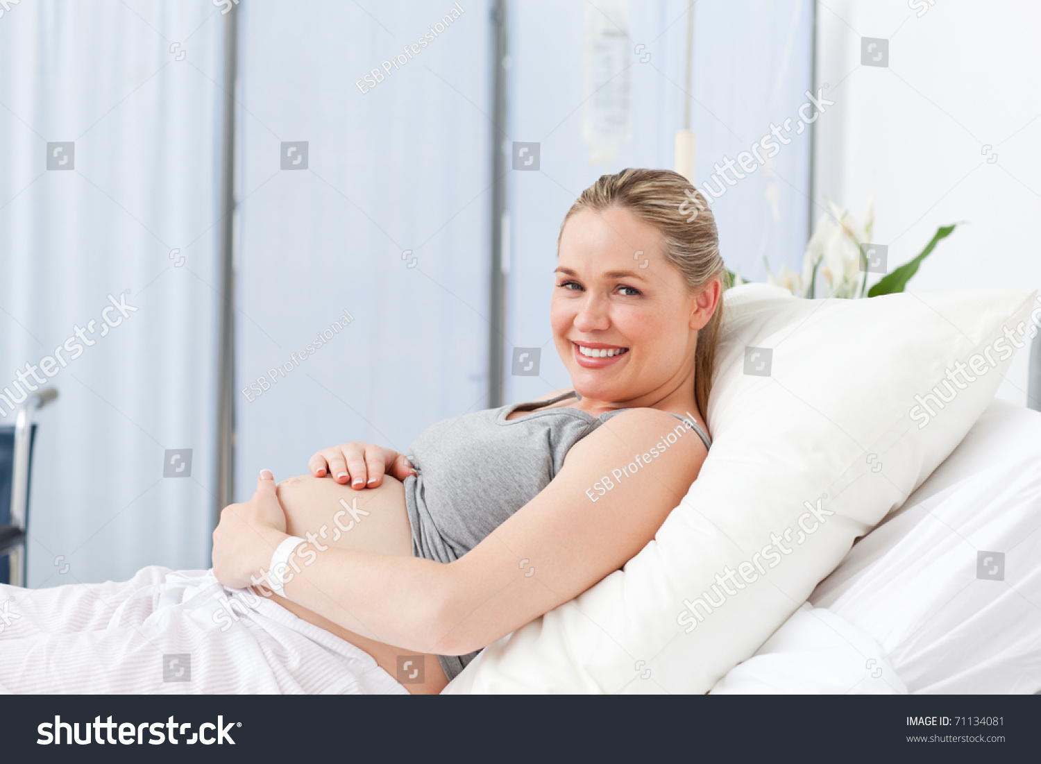 Pregnant Young Woman On A Hospital Bed Stock Photo 71134081 : Shutterstock