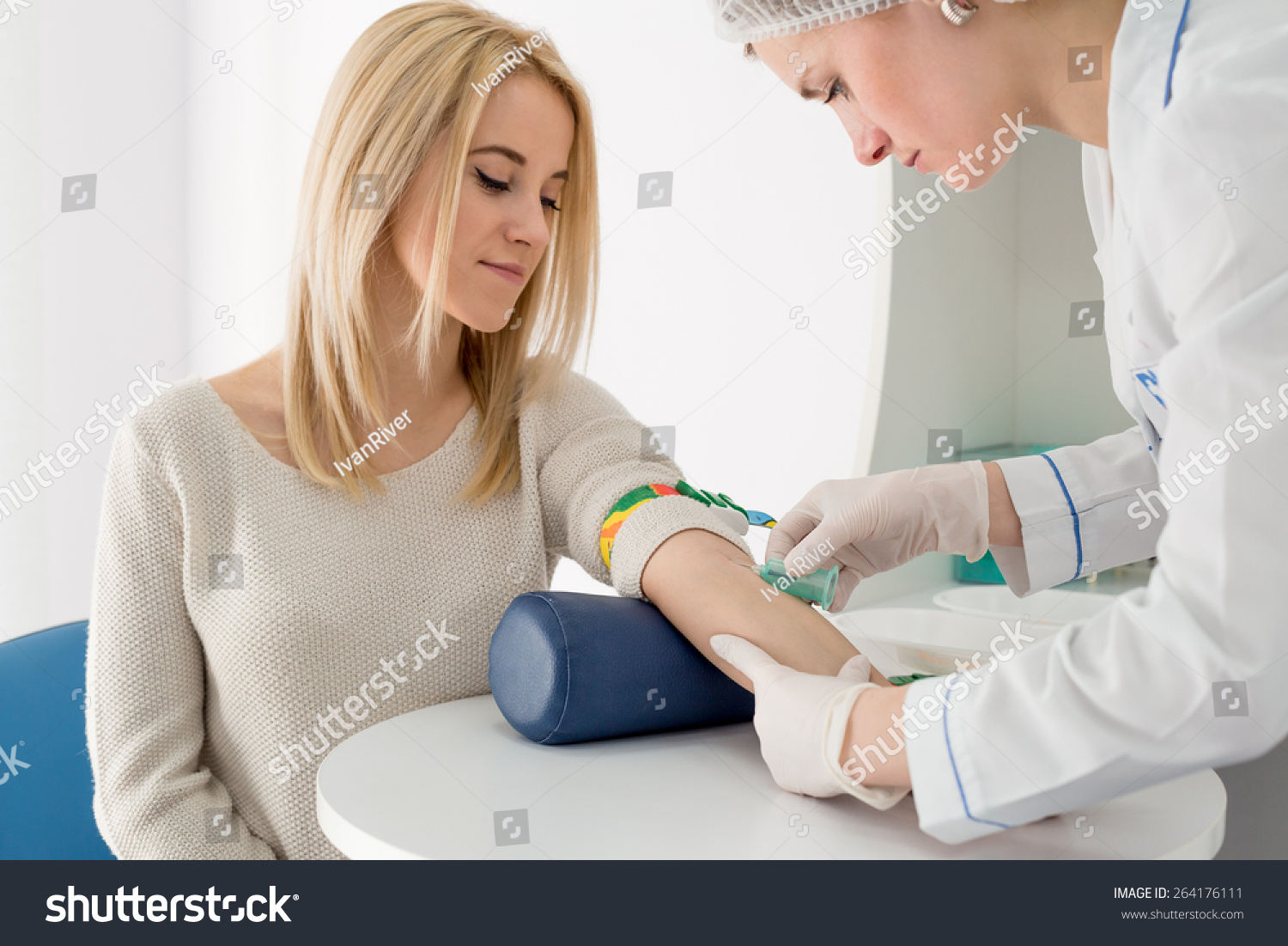 Preparation For Blood Test With Pretty Young Blond Woman By Female ...