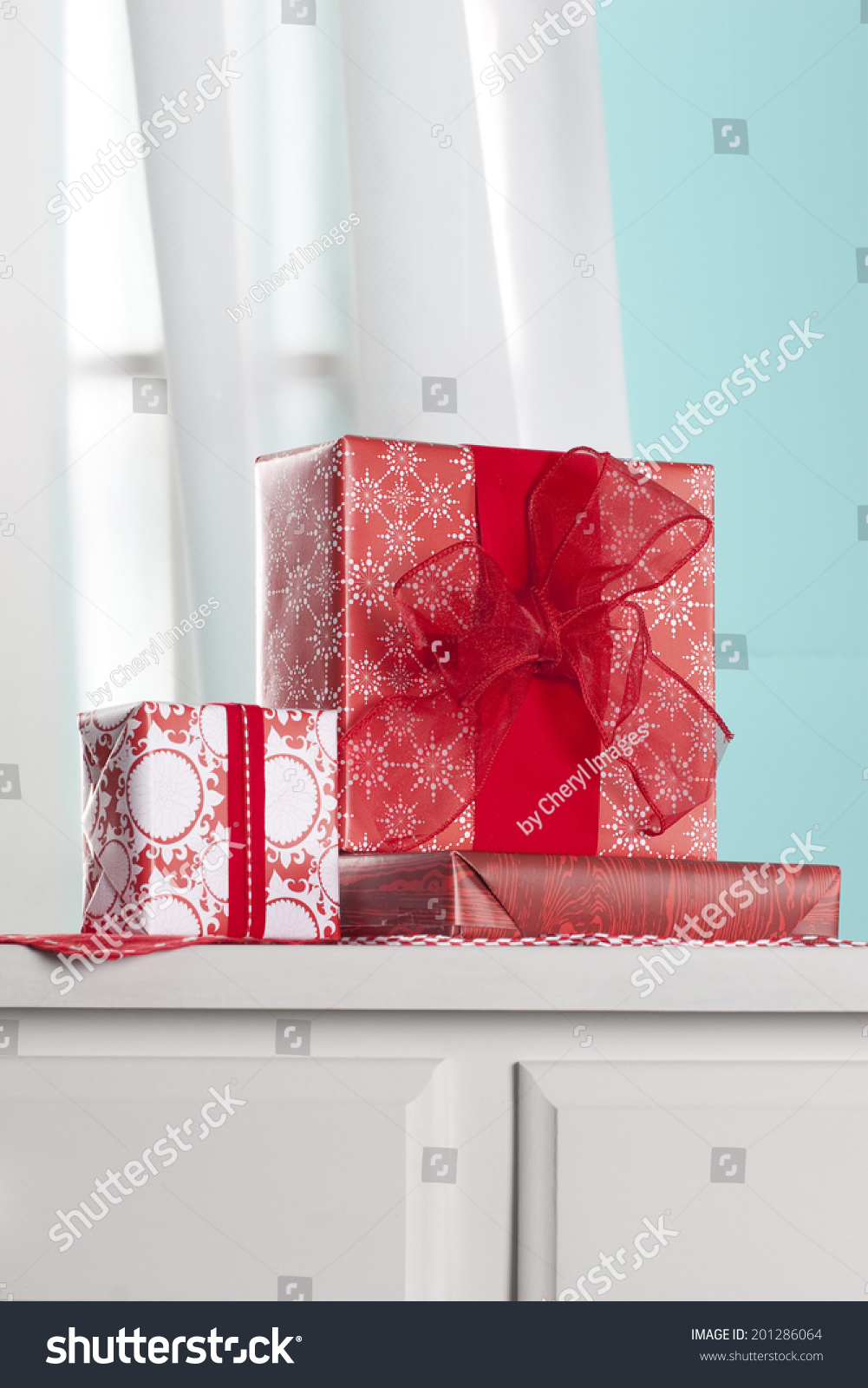 Presents On Dresser Front Window Inside Holidays Objects Stock