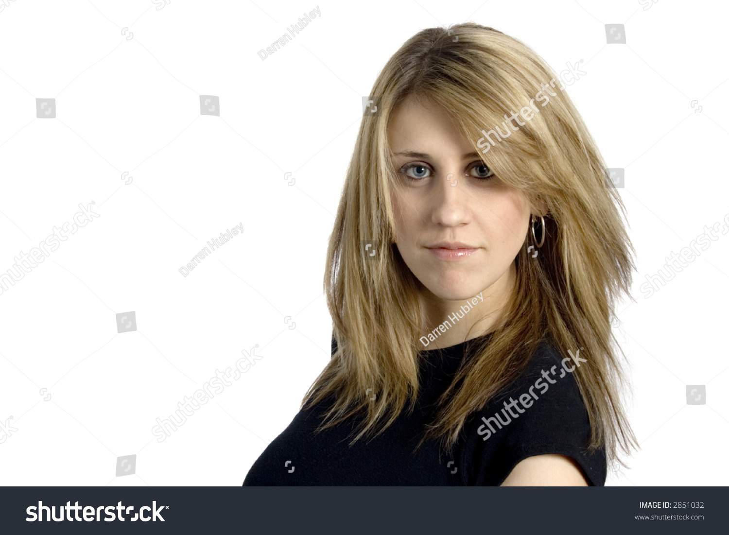 Pretty Blond Woman Tossing Her Hair And Looking Straight Forward Stock ...