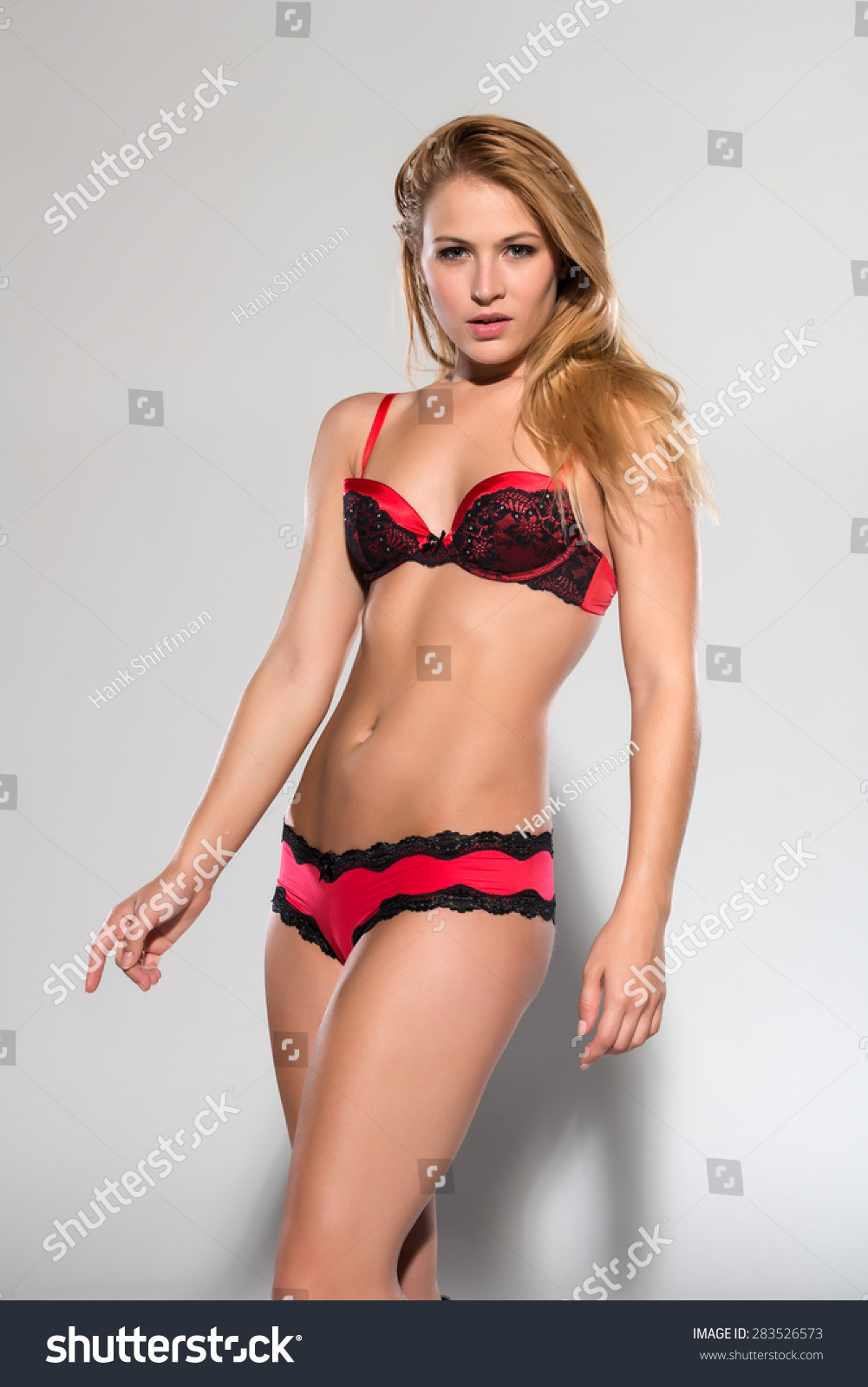 Pretty Woman In Red Bra And Underwear Lingerie Black Stockings