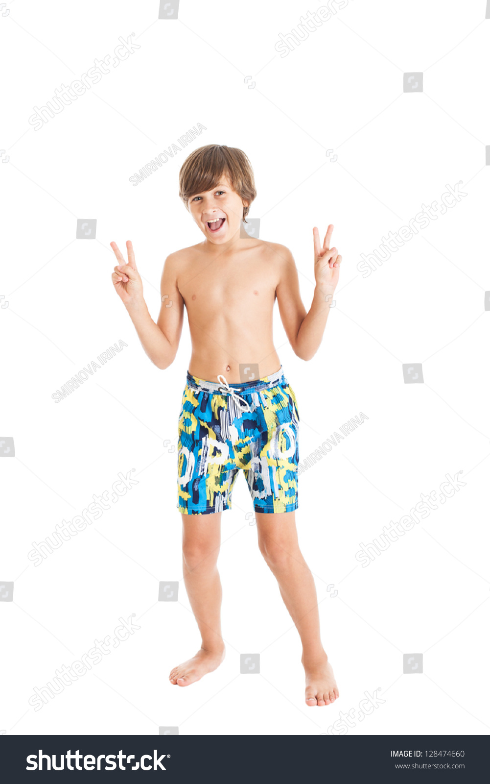 Pretty Slender Teenage Boy Wearing Swimming Shorts, Shows Signs Of ...
