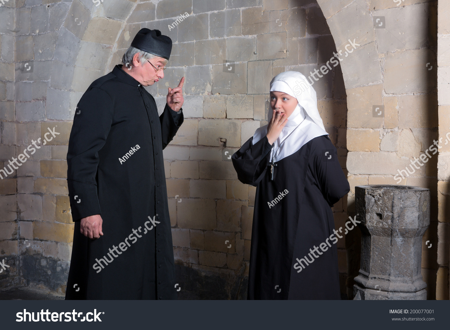 Priest Giving A Young Novice A Reprimand Stock Photo 200077001 ...