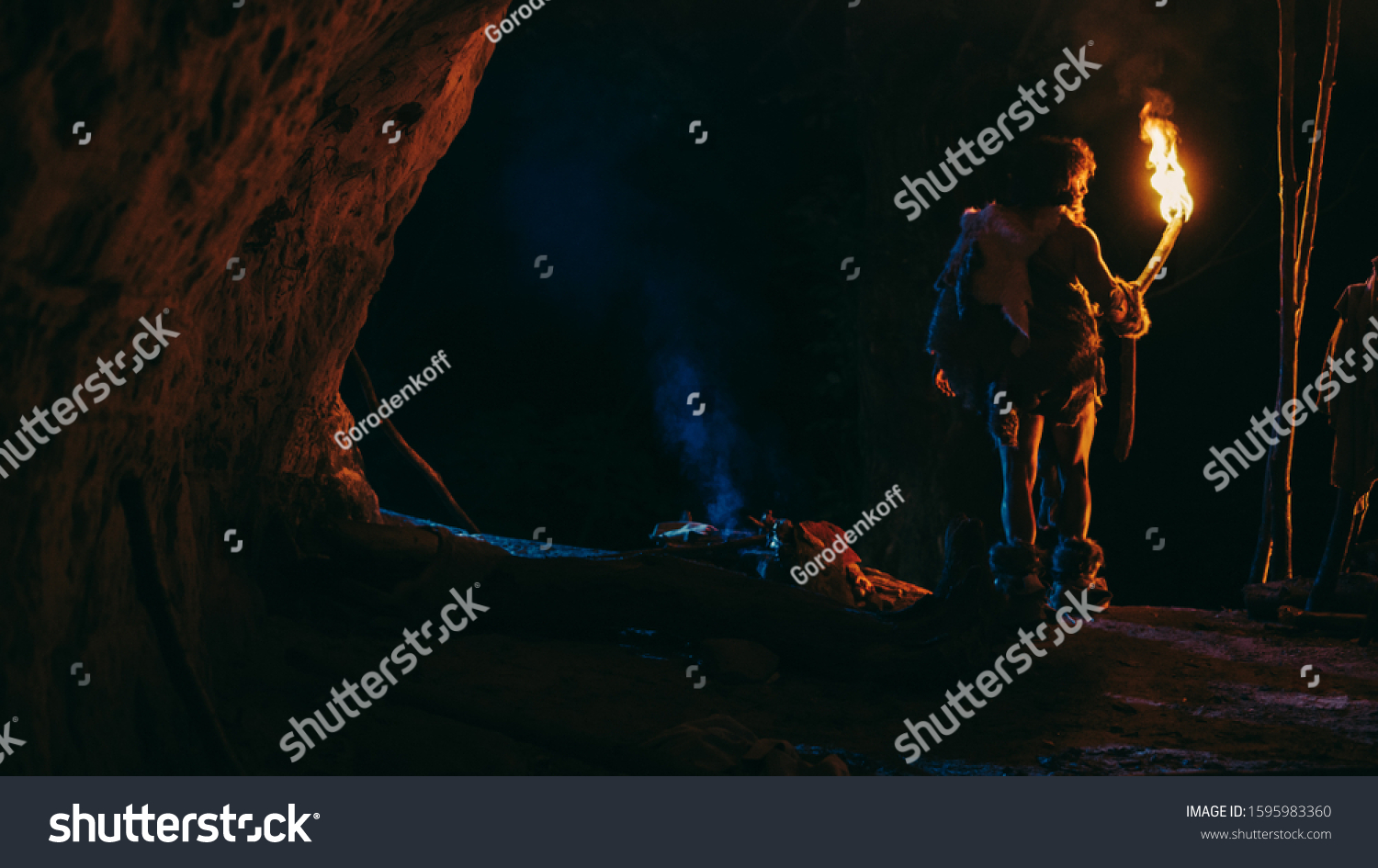 725 Caveman Torch Images Stock Photos Vectors Shutterstock   Stock Photo Primeval Caveman Wearing Animal Skin Stands In A Cave At Night Holding Torch With Fire Looking Out 1595983360 