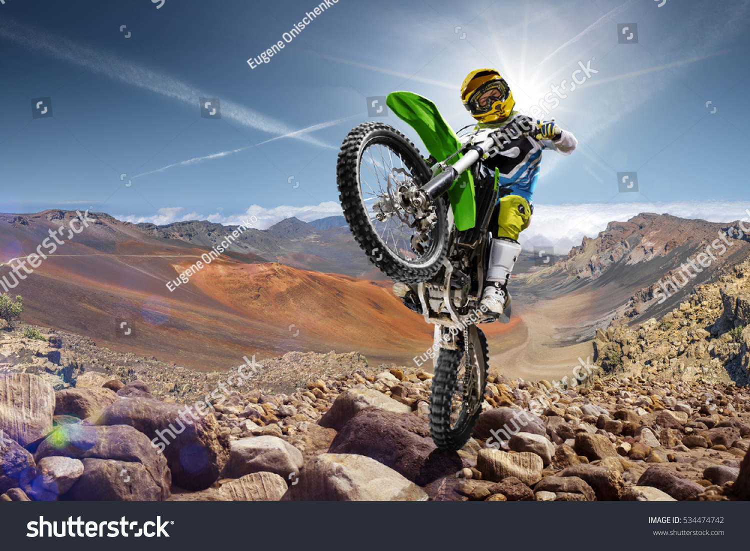 professional-dirt-bike-rider-doing-wheely-stock-photo-534474742