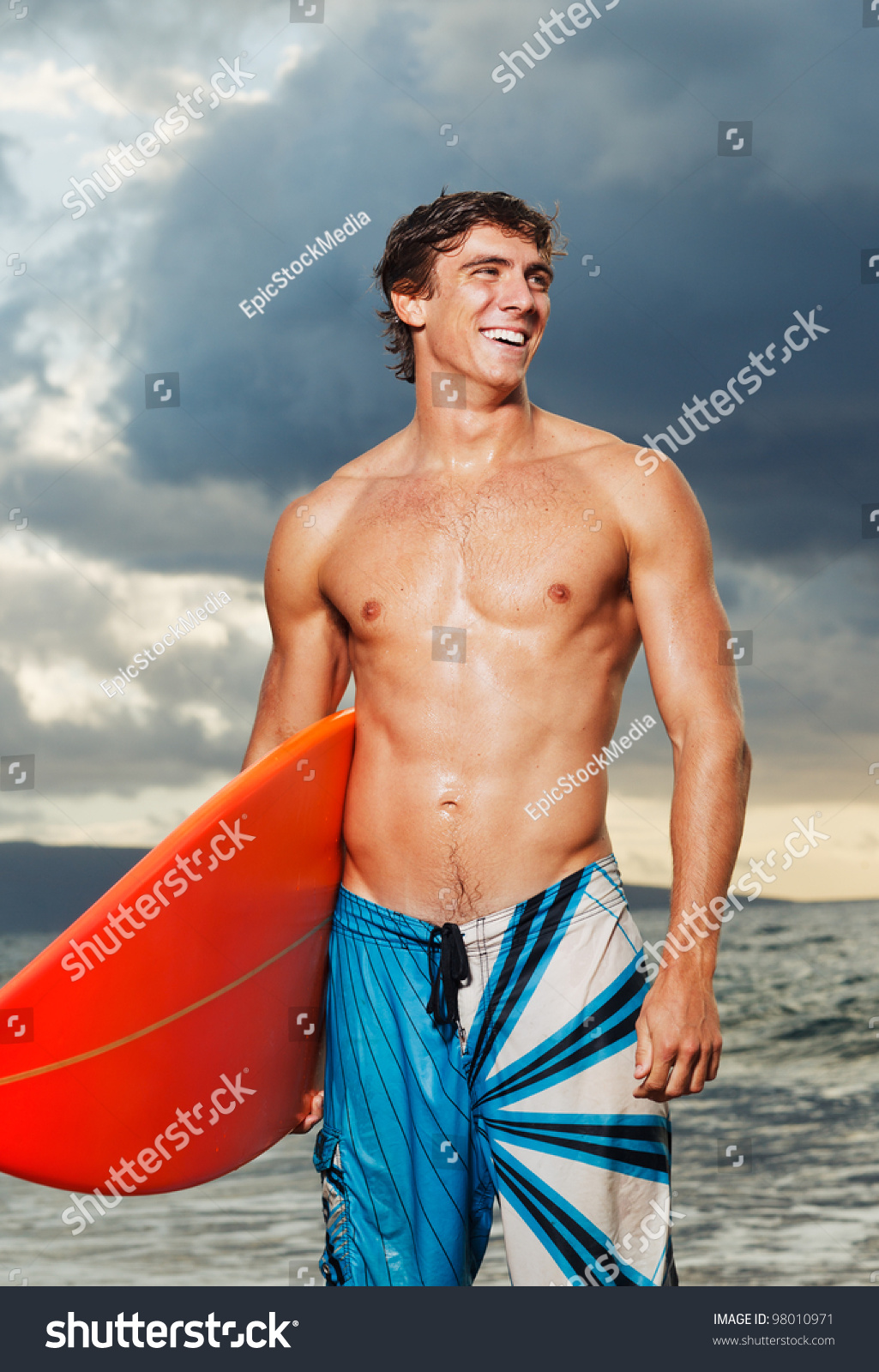 Professional Surfer Holding A Surf Board Stock Photo 98010971 ...