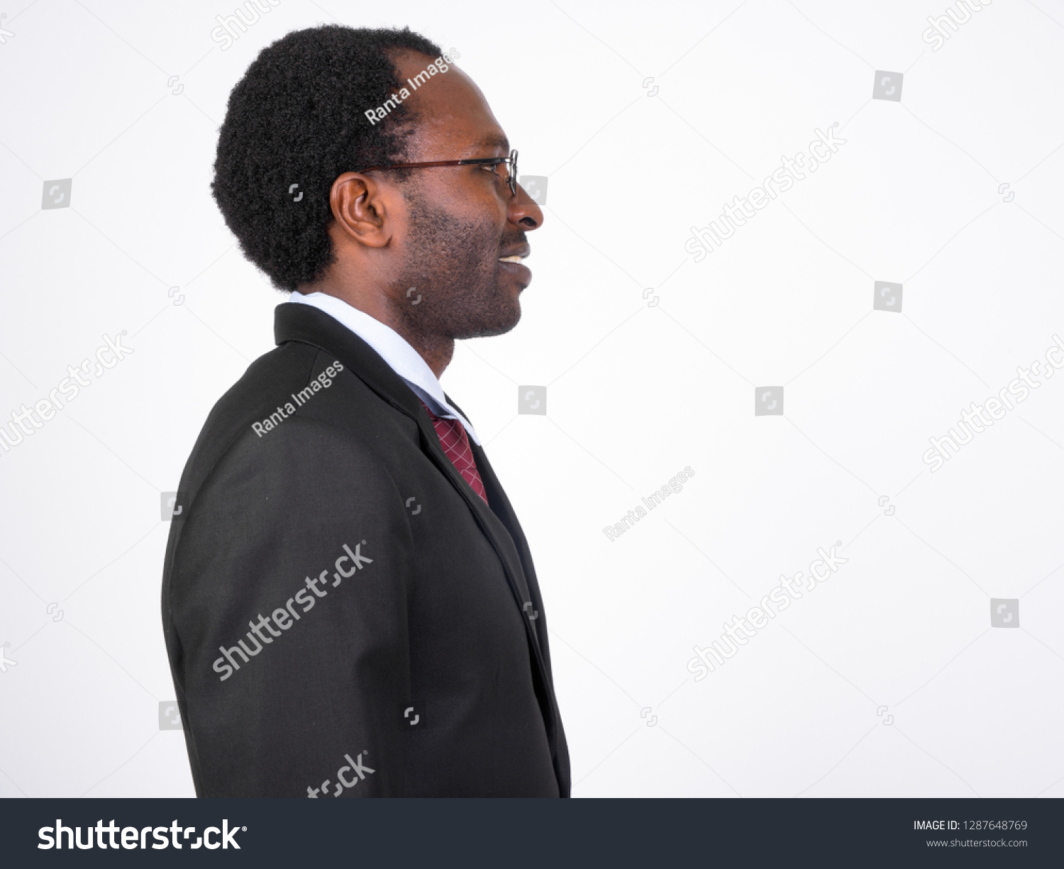 profile view happy african businessman eyeglasses stock photo edit now 1287648769 shutterstock