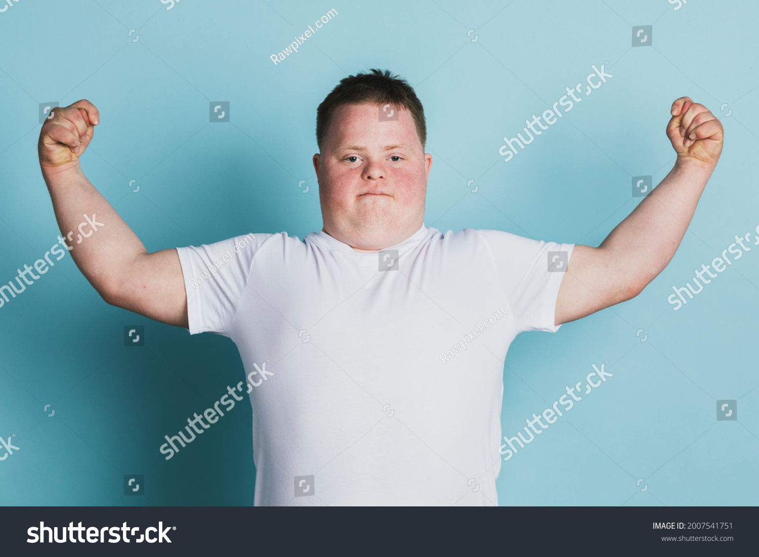 Proud Boy Down Syndrome Flexing His Stock Photo 2007541751 Shutterstock