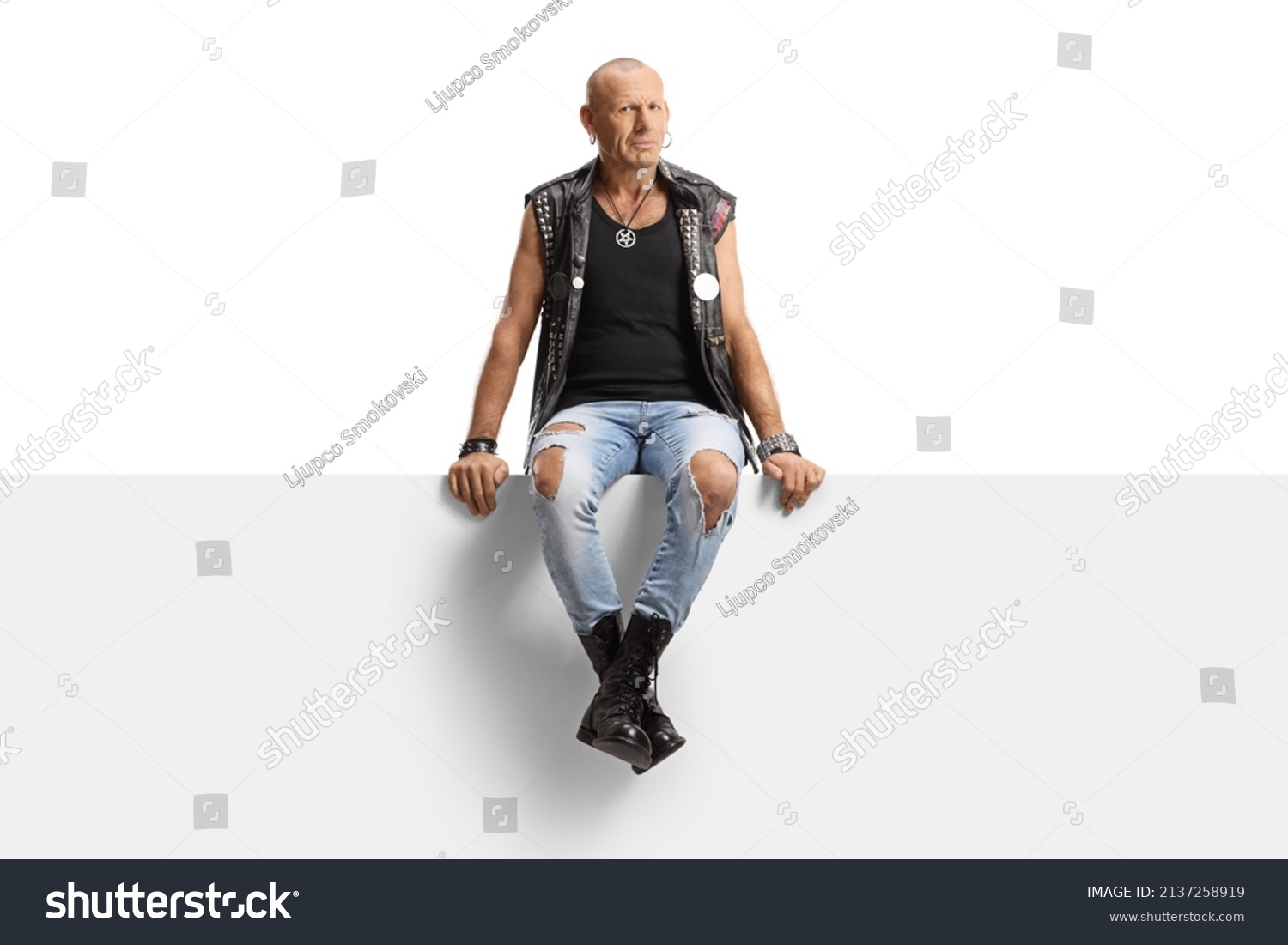 Punk Man Ripped Jeans Sitting On Stock Photo 2137258919 | Shutterstock