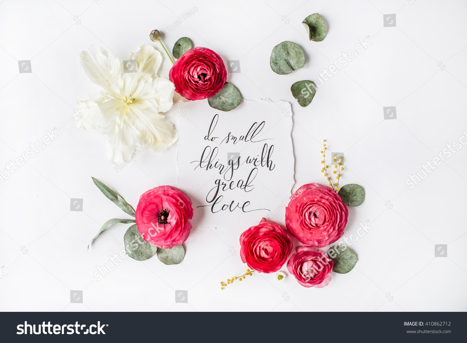 quote "Do small things with great love" written in calligraphy style on paper with