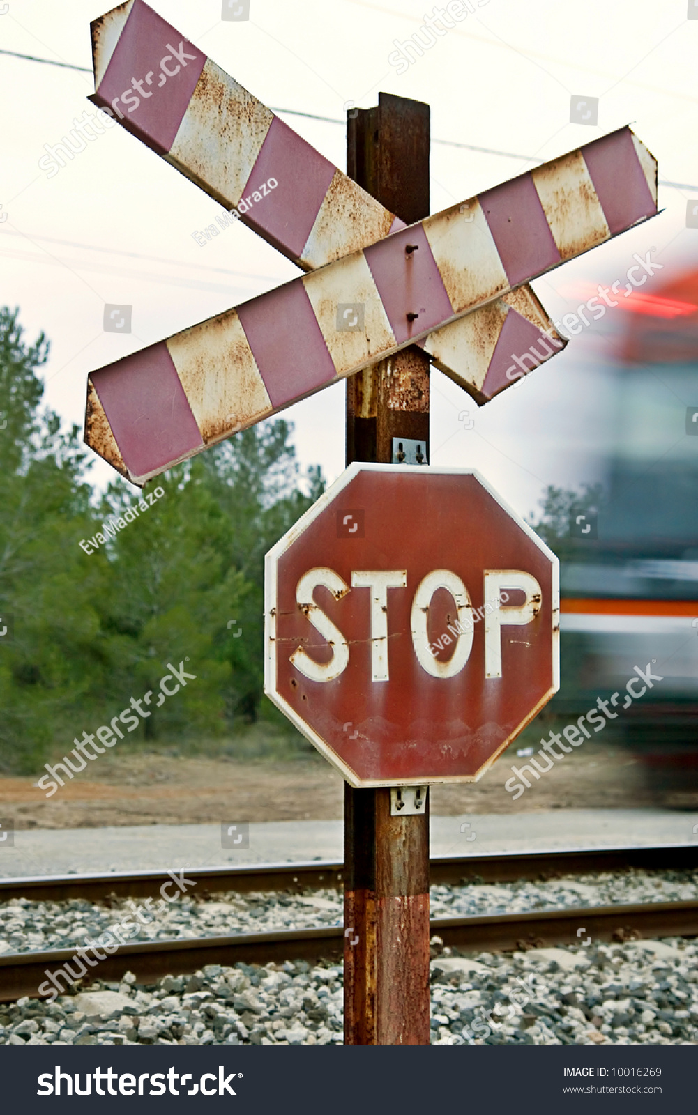 Railway Stop Sign With Train Movement Blur Off To The Right. Stock ...