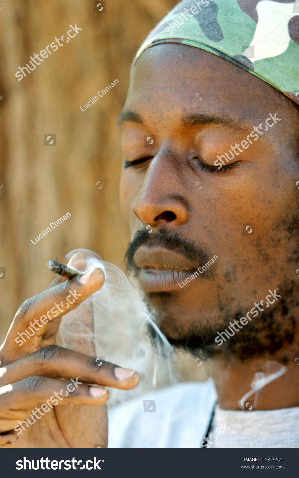 Rastafarian Man Smoking Cannabis Stock Photo 1829672 : Shutterstock