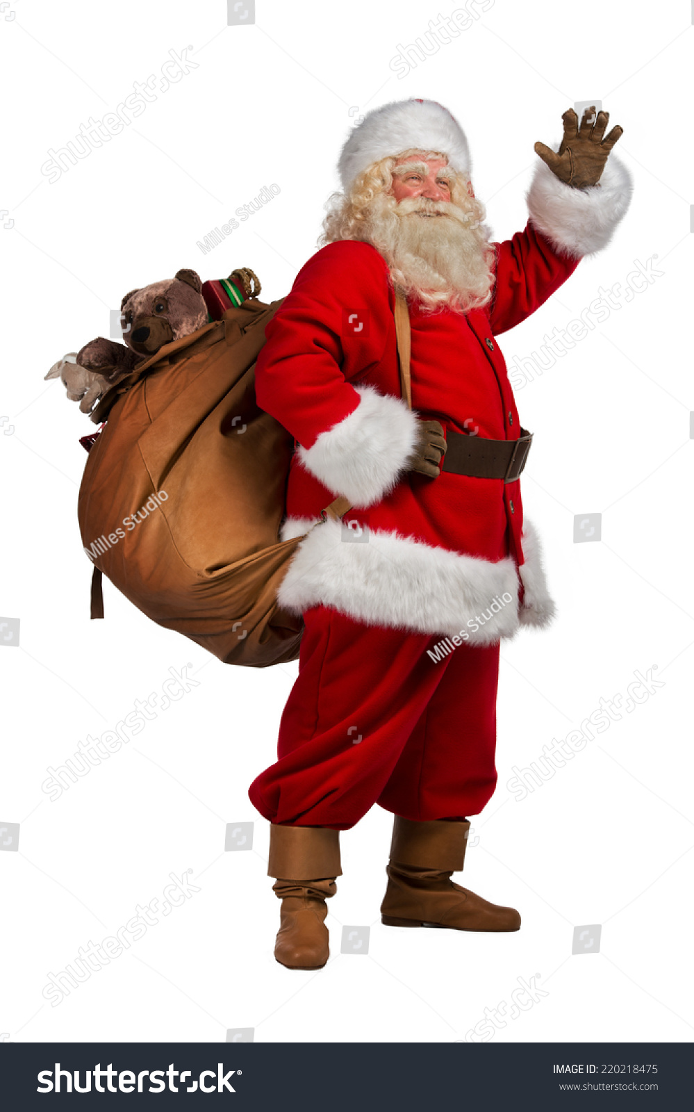 Real Santa Claus Carrying Big Bag Full Of Gifts, Isolated On White ...