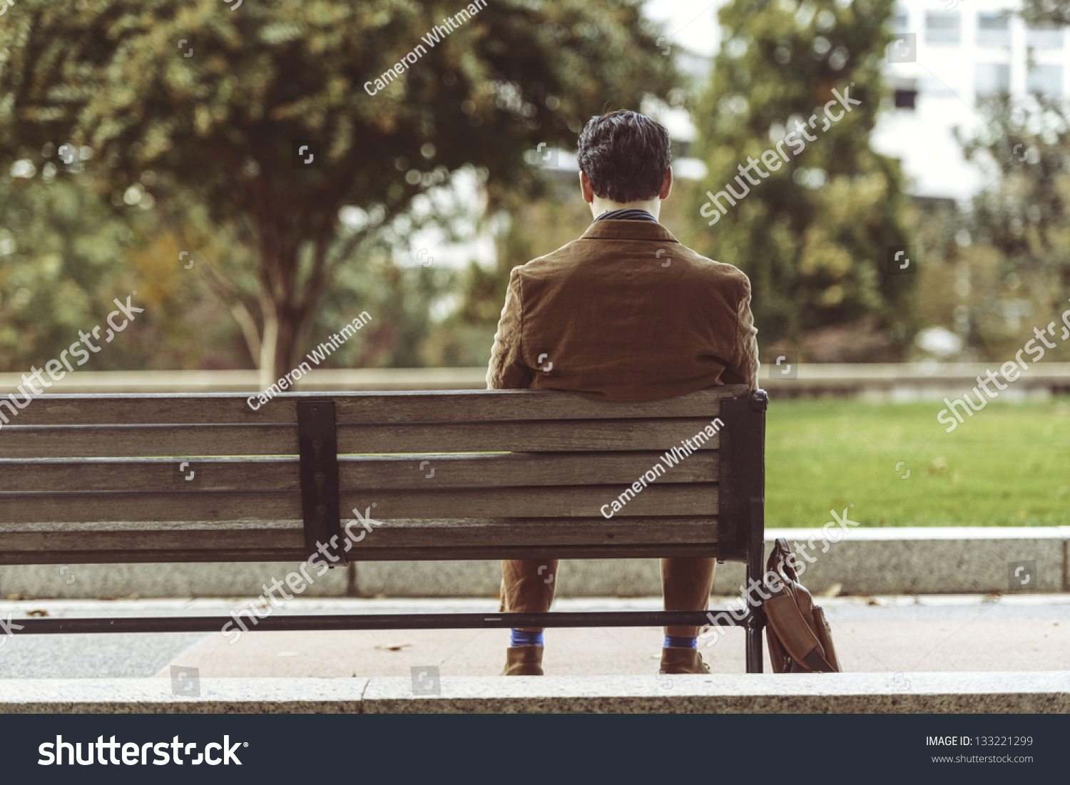 Rear View Of A Man Sitting At Park Bench Waiting Stock Photo 133221299 ...