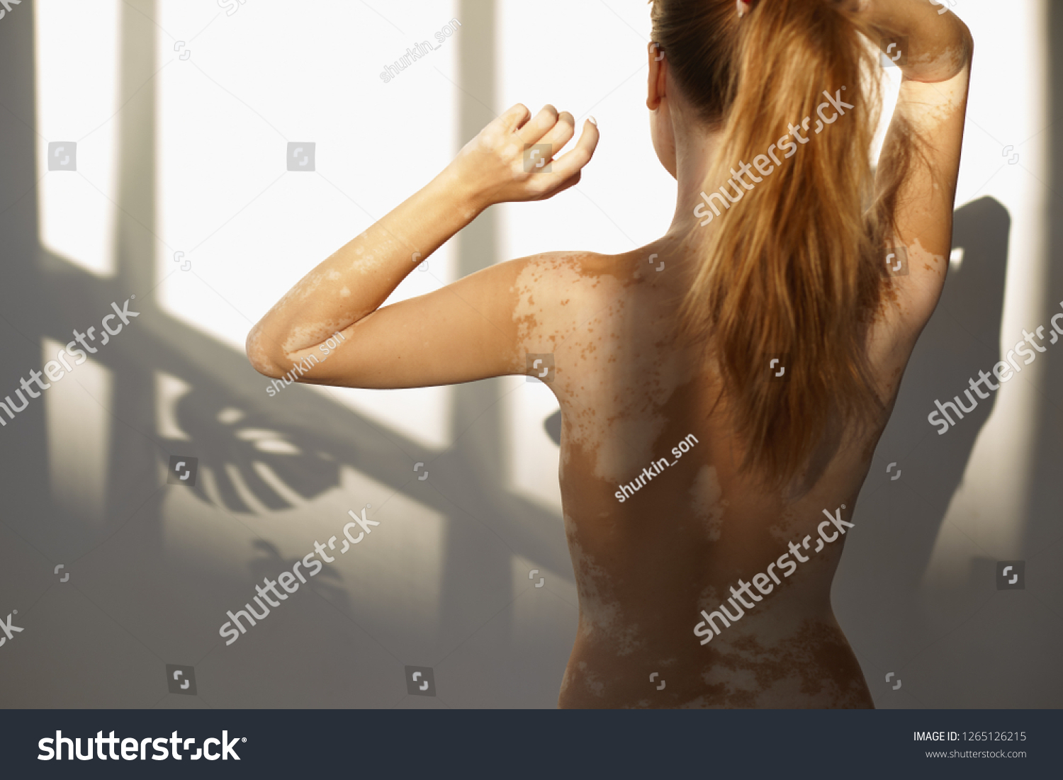 Dark haired girl goes out of shower and shows nude body