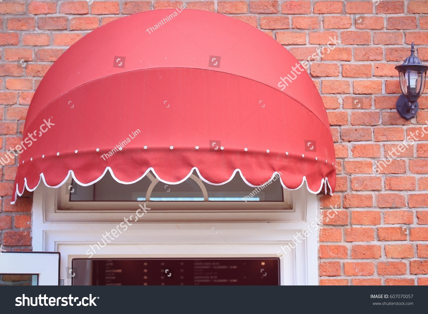 Red Awning Stock Photo Edit Now 607070057 Shutterstock