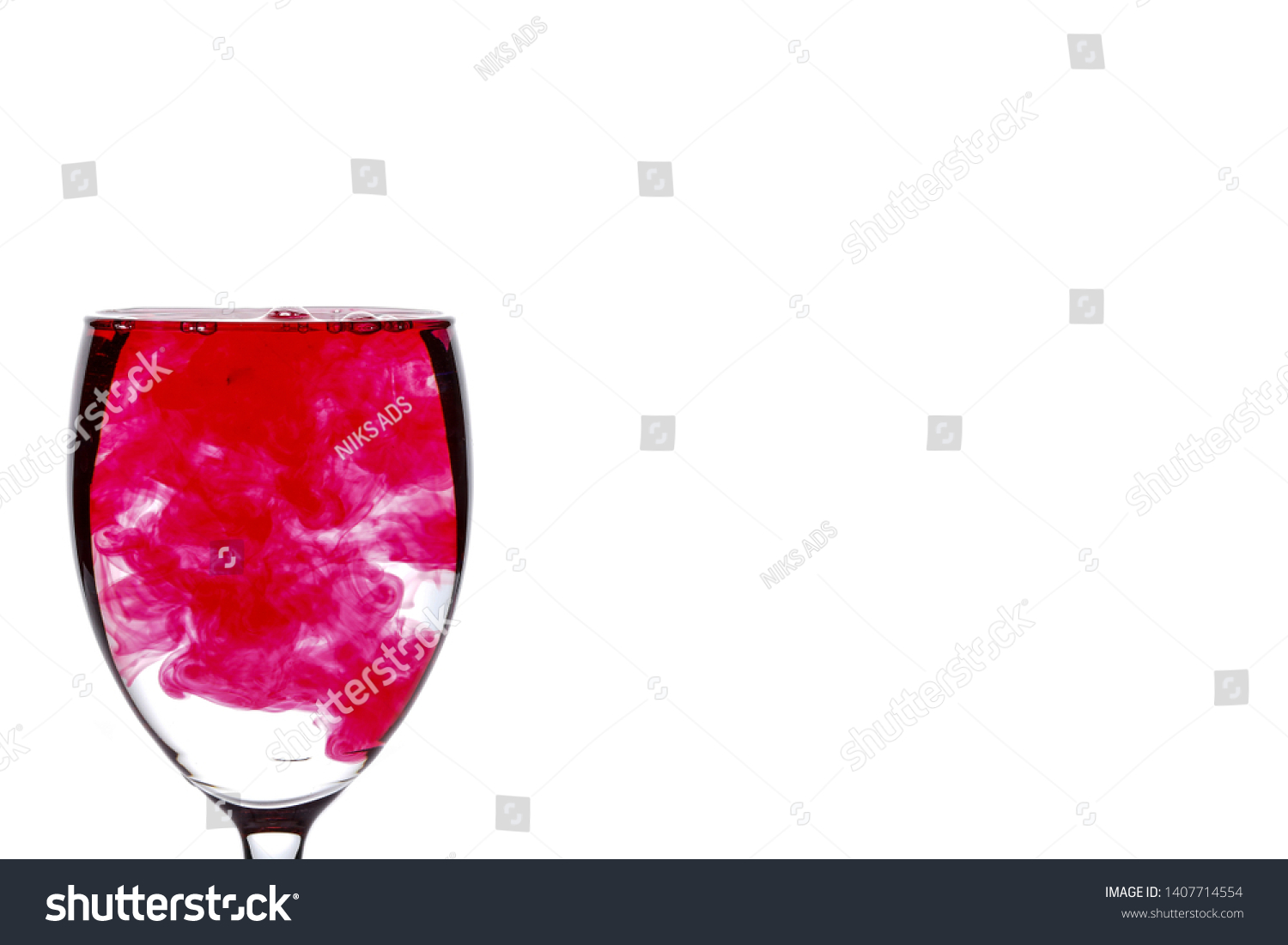 red-food-coloring-diffuse-water-inside-stock-photo-1407714554