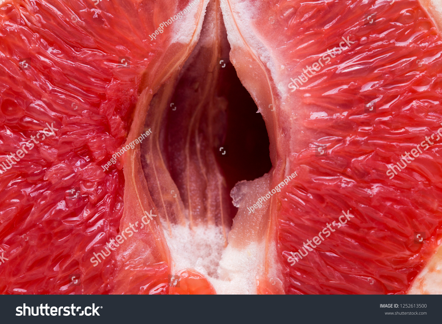 stock-photo-red-grapefruit-looking-like-female-vagina-vulva-symbol-1252613500.jpg