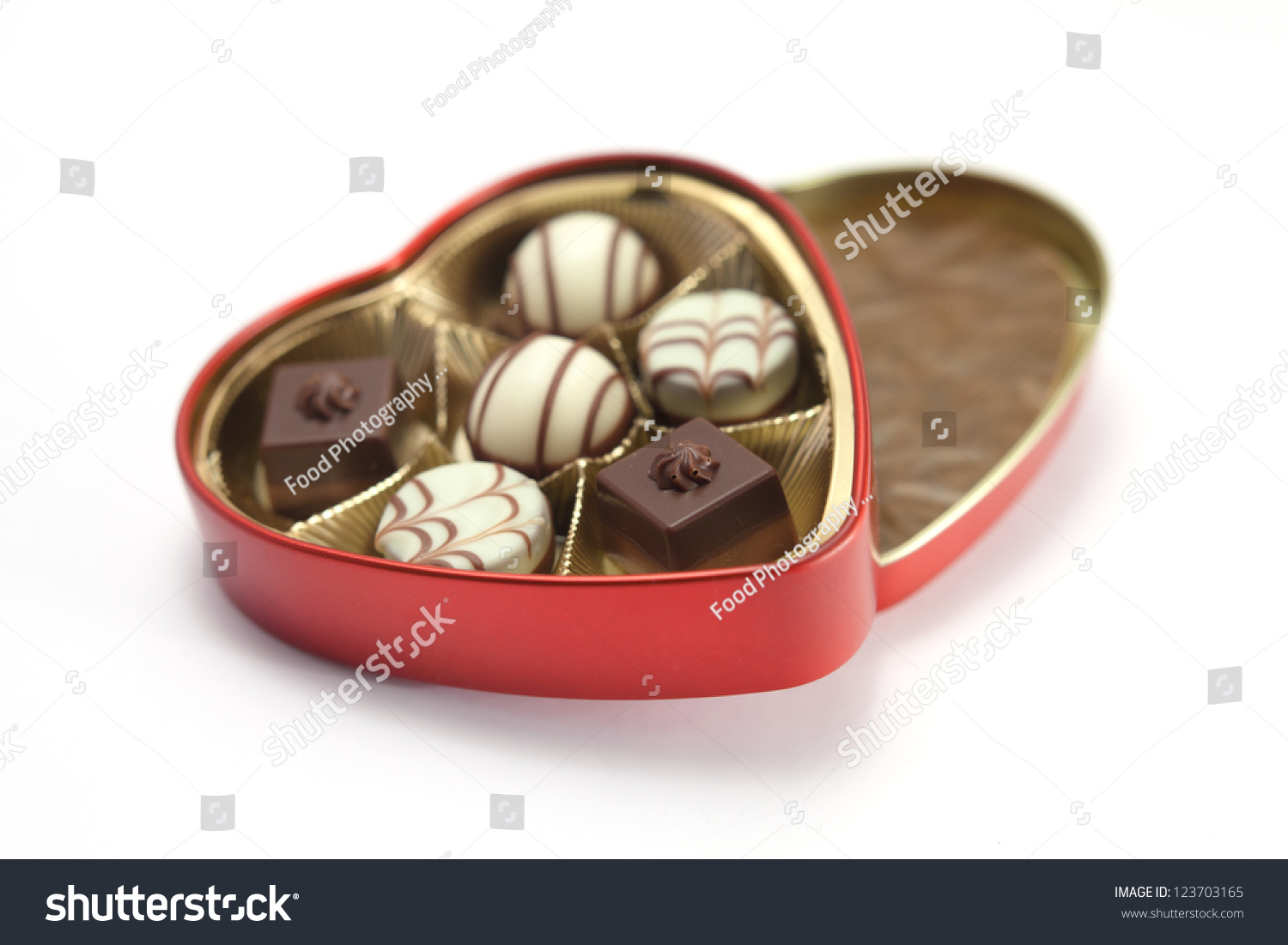 Red Heart Shaped Box Chocolates On Stock Photo Edit Now 123703165