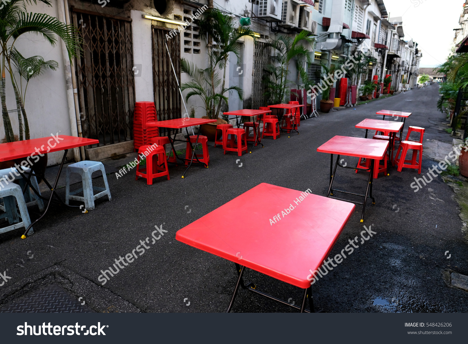 Red Table Back Alley Stock Photo Edit Now 548426206