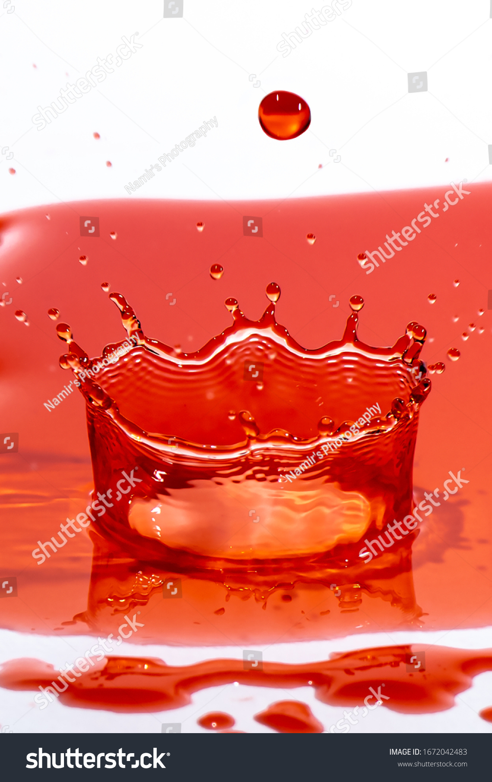 Red Water Splash White Background Stock Photo 1672042483 | Shutterstock