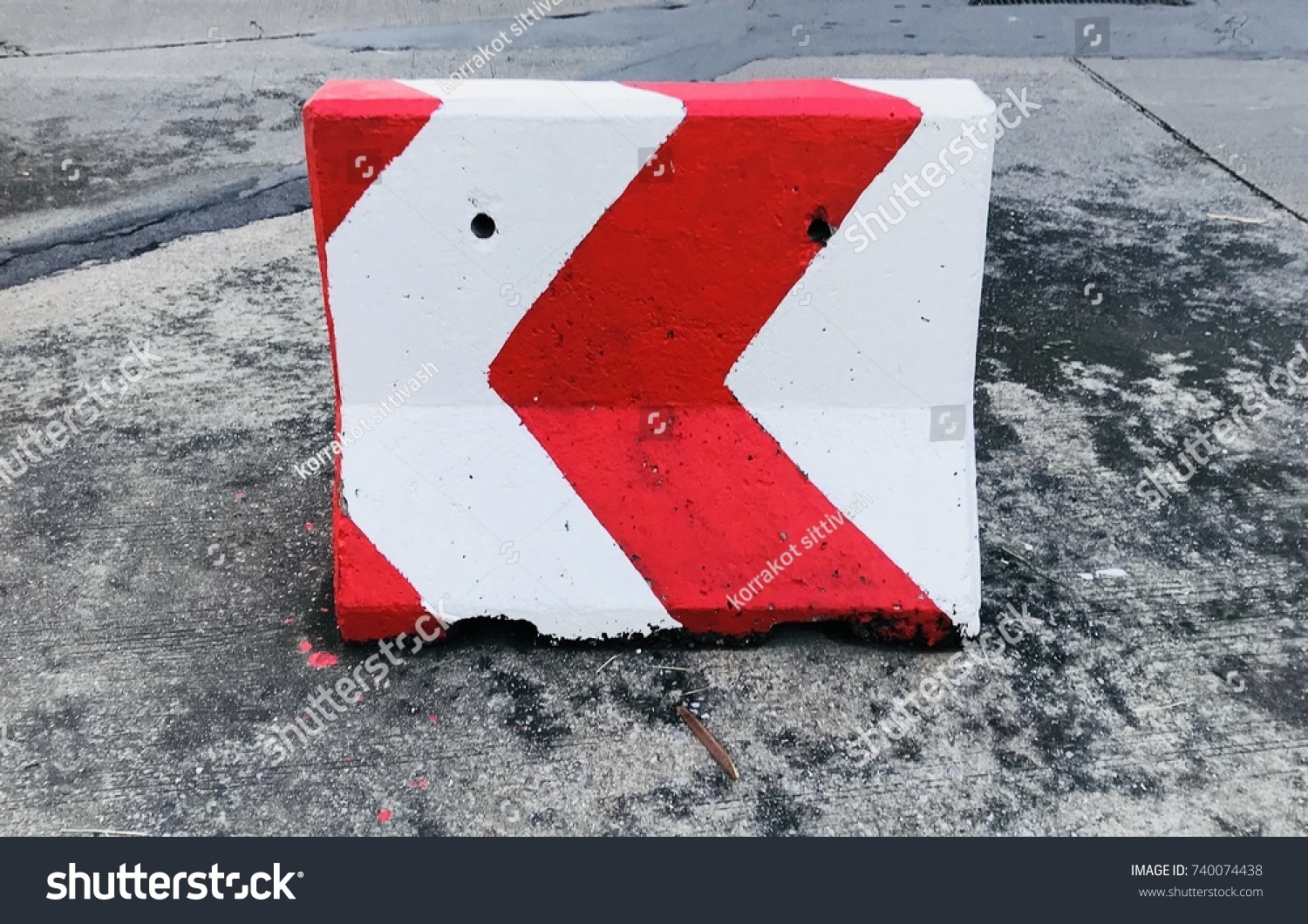 stock-photo-red-white-concrete-barrier-740074438.jpg