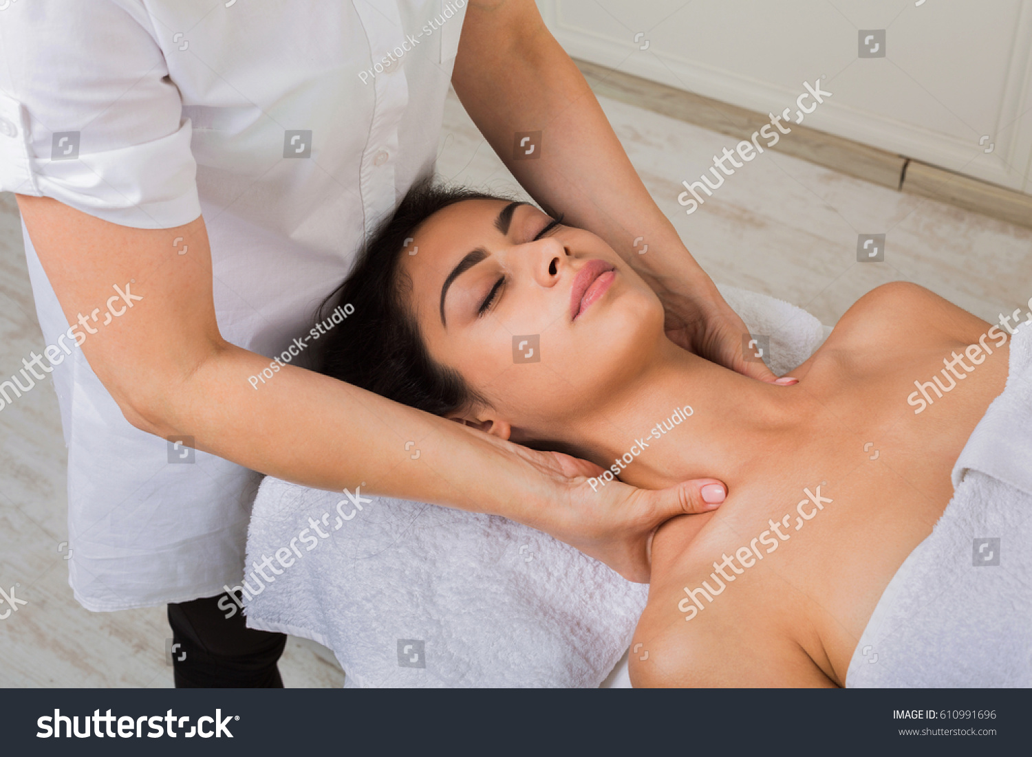 Getting a nice throat massage at the parlor