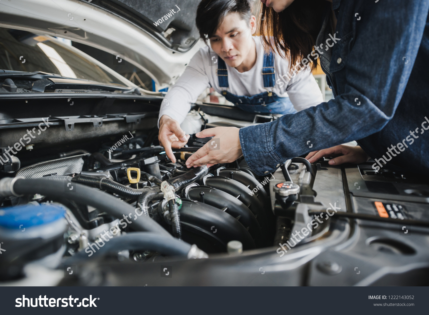 Reliable Auto Mechanics >> Reliable Auto Mechanic Talking Female Customer Stock Photo Reliable Auto Mechanics >> Reliable Auto Mechanic Talking Female Customer Stock Photo