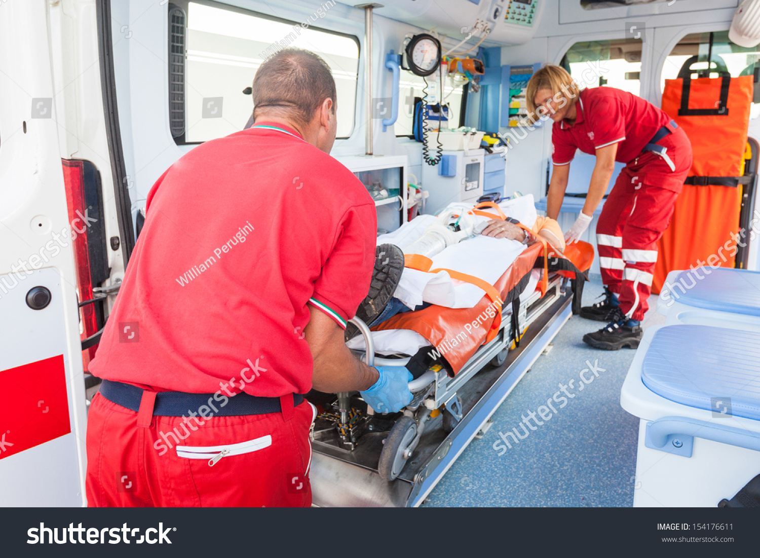 Rescue Team Providing First Aid Stock Photo (Edit Now) 154176611