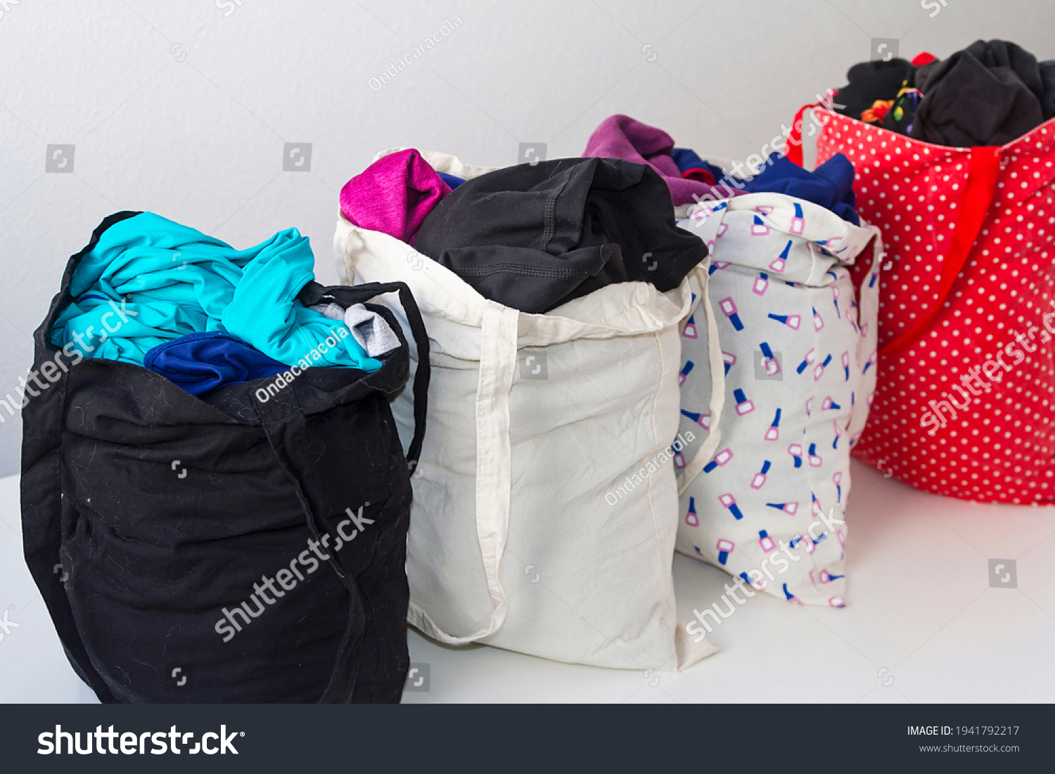 42,612 Bag full of clothes Images, Stock Photos & Vectors | Shutterstock