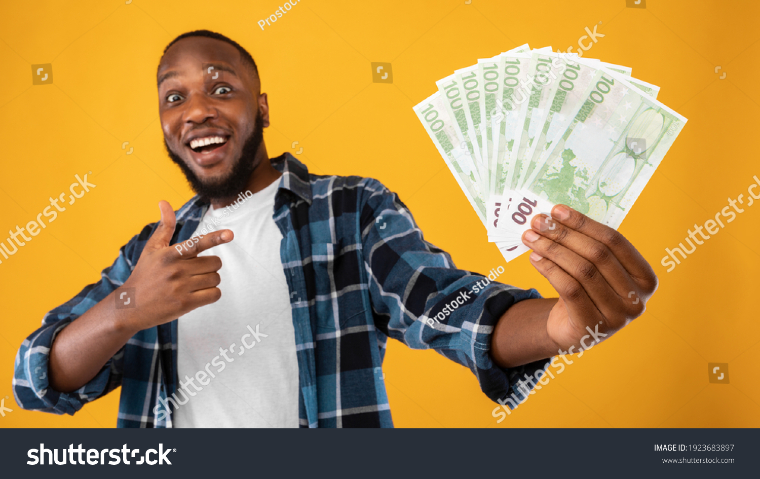 Rich African Man Holding Money Pointing Stock Photo (Edit Now) 1923683897