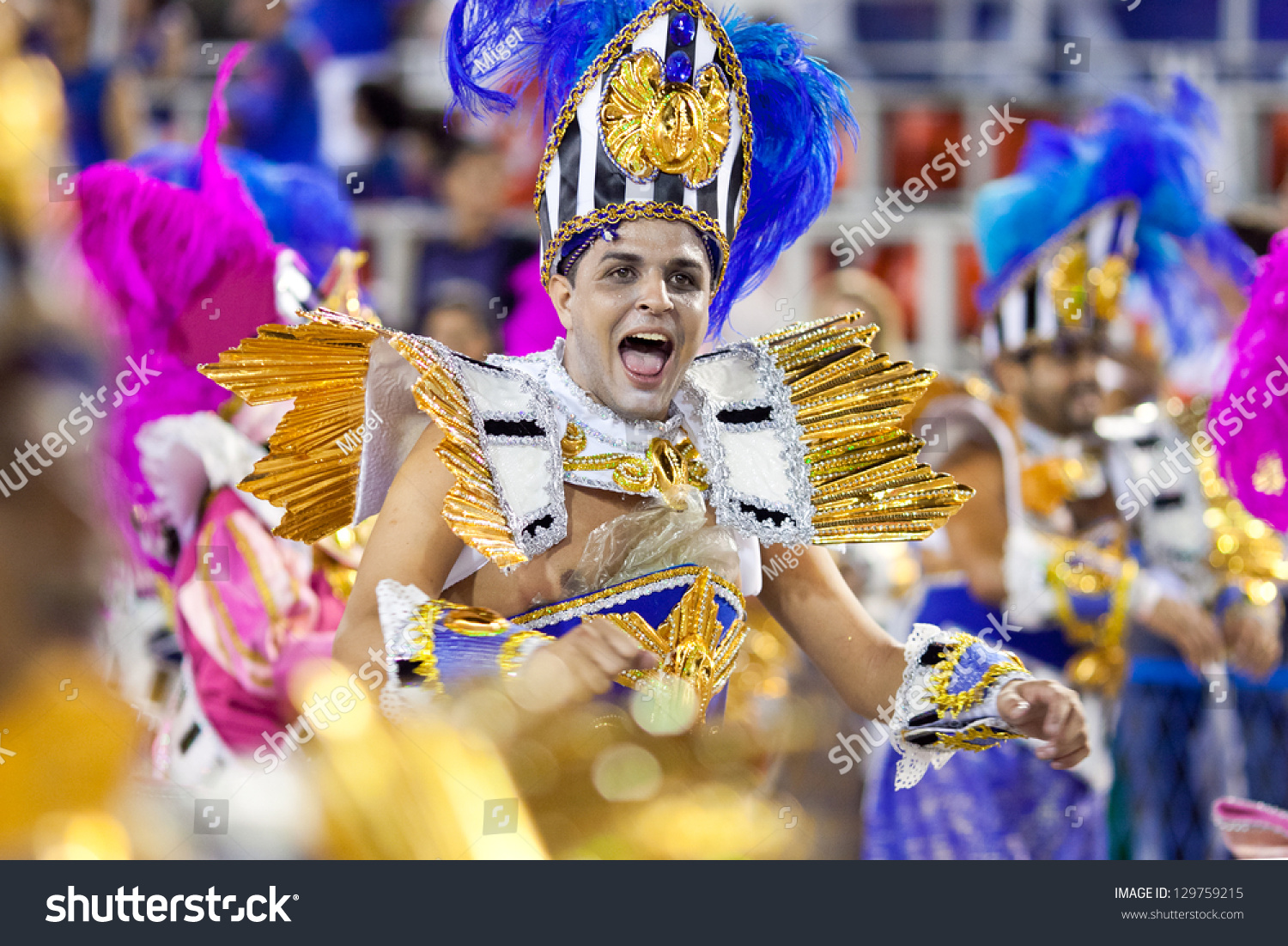 Rio De Janeiro - February 11: A Man In Costume Singing And Dancing On ...