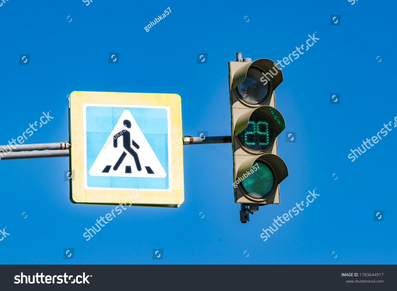 road-sign-pedestrian-crossing-traffic-light-stock-photo-1783644917