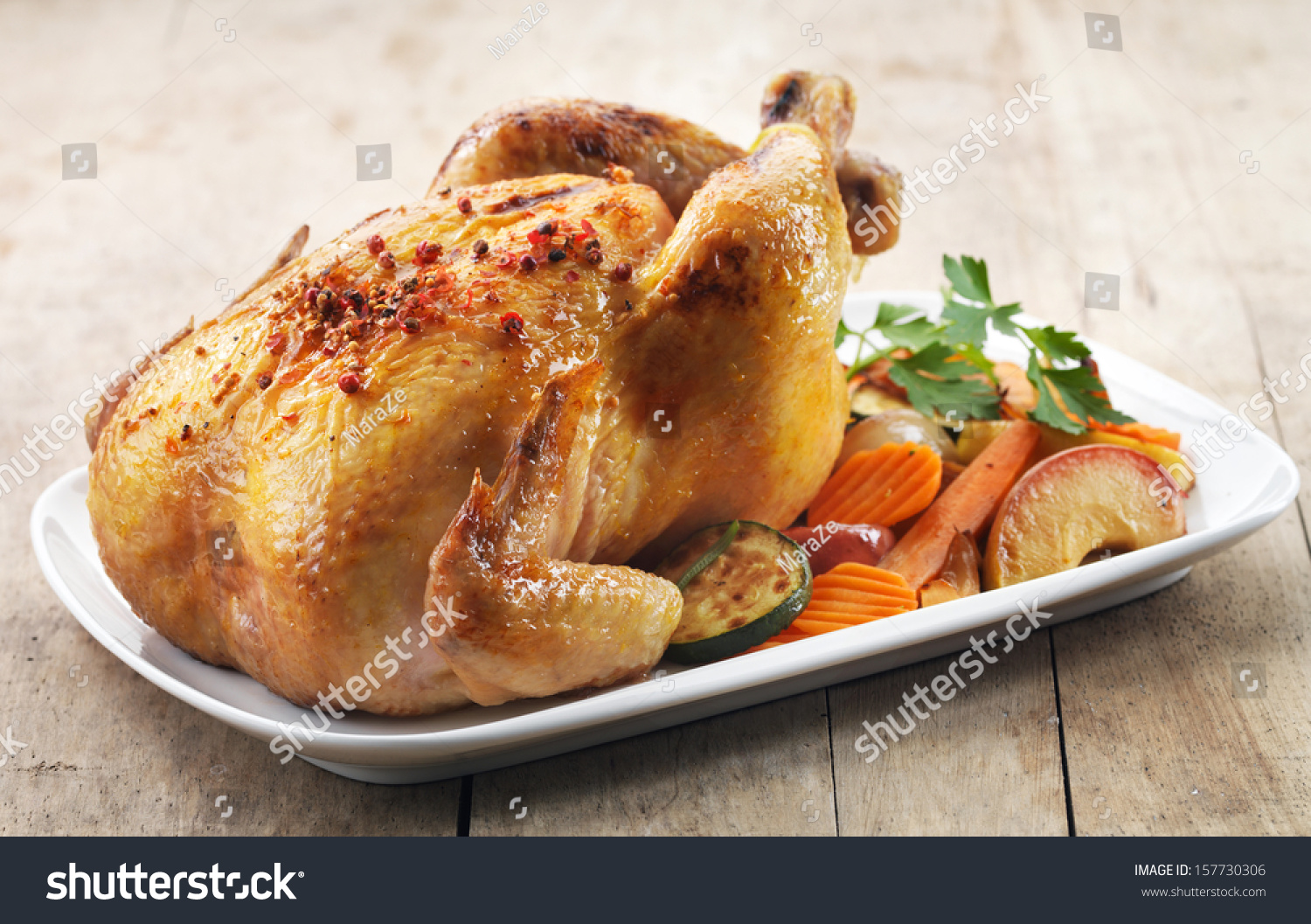 Roast Chicken And Various Vegetables On A White Plate Stock Photo ...