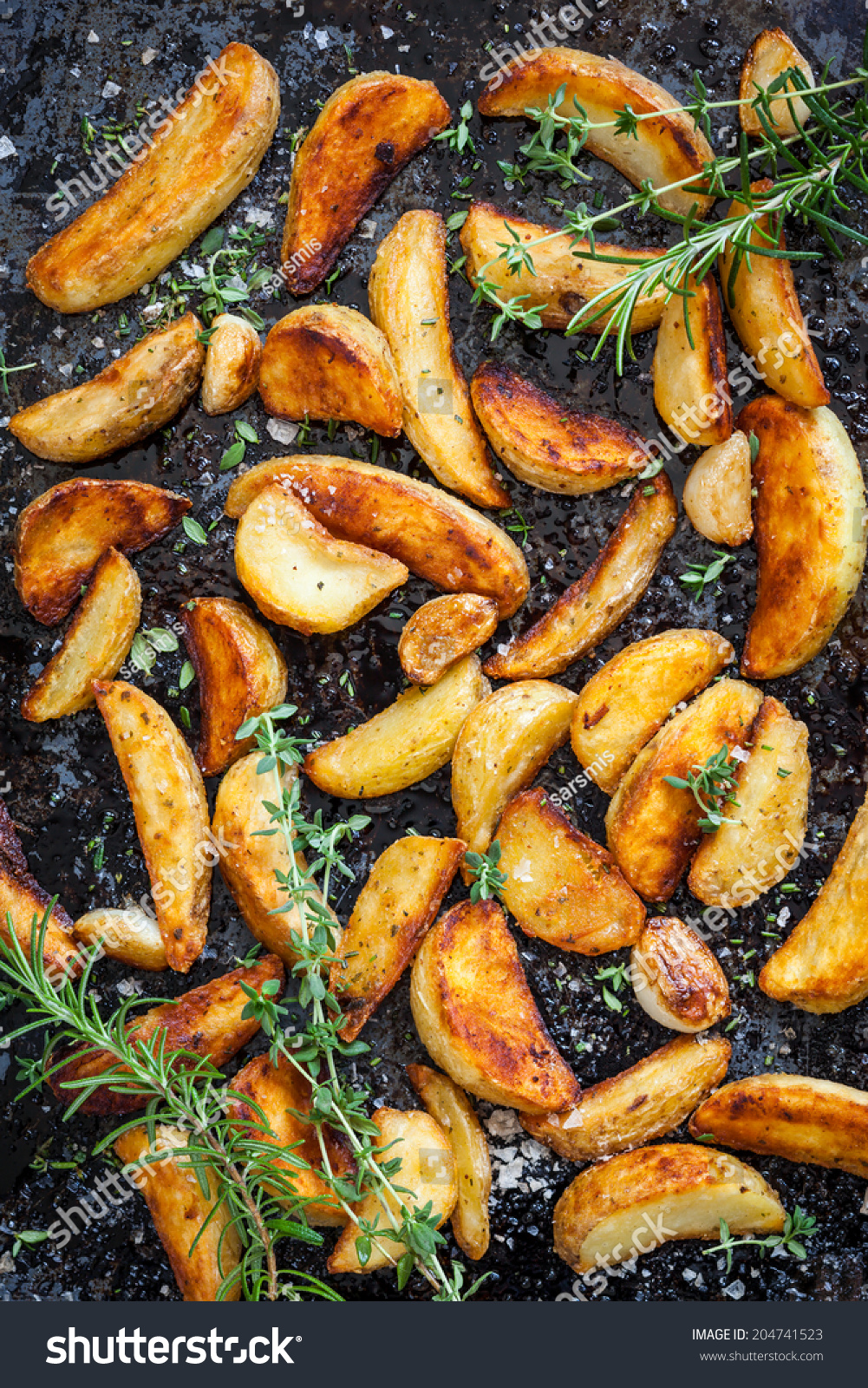 Roasted Potato Wedges Herbs Garlic On Stock Photo Edit Now 204741523