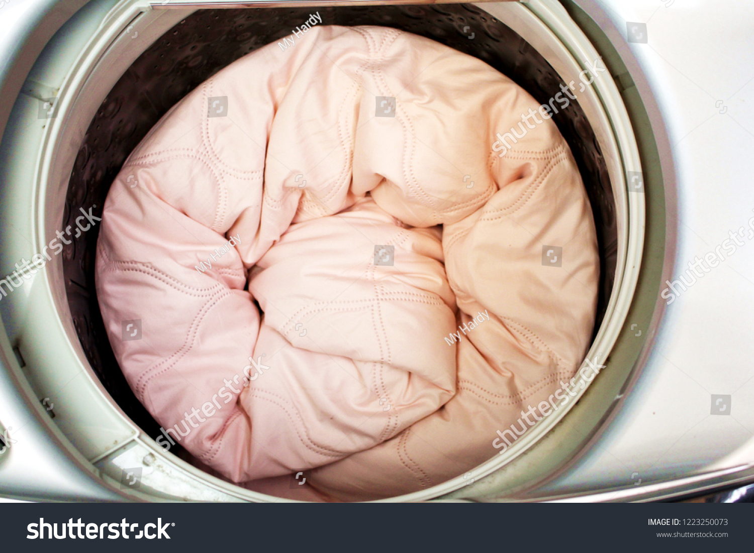 Roll Pink Duvet Put Washing Machine Stock Photo Edit Now 1223250073