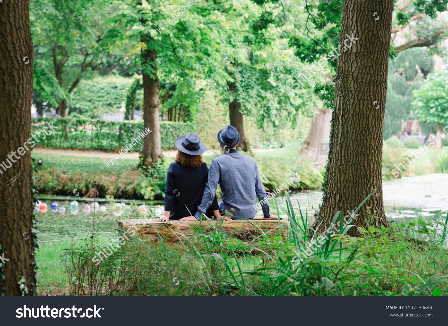 Romantic Couple Sit Stock Photo (Edit Now) 1197230644