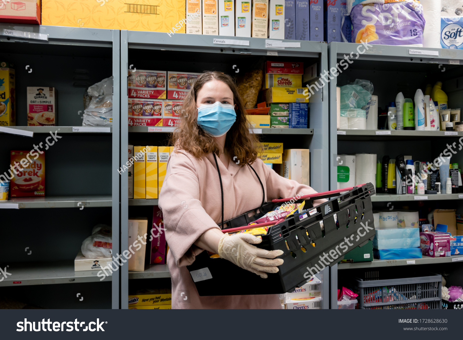 Stock Photo Rotherham Uk May A Volunteer At A Trussell Trust Food Bank Wears Gloves And Face Mask 1728628630 