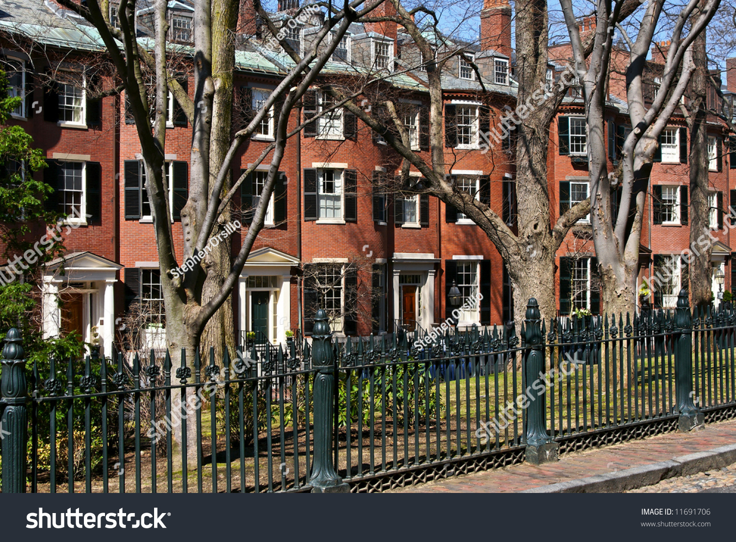 Row Of Beacon Hill Brownstones With Trees And Wrought Iron Fencing ...