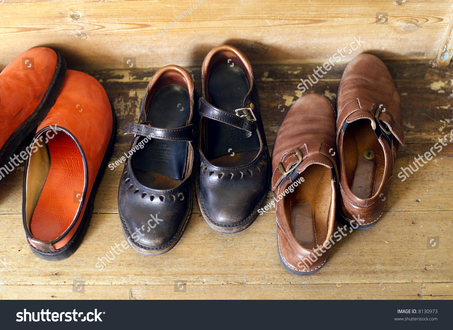 Row Of Shoes Lined Up Near House Front Door Stock Photo 8130973 ...