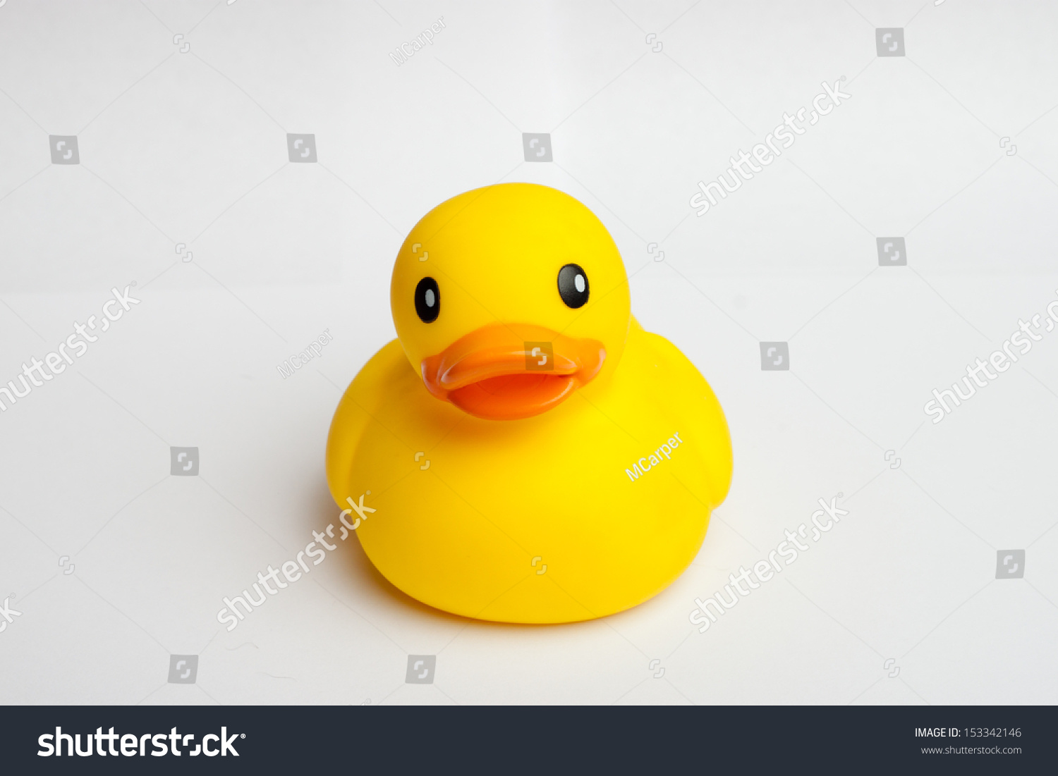 Rubber Duck Staring Against White Background Stock Photo (Edit Now