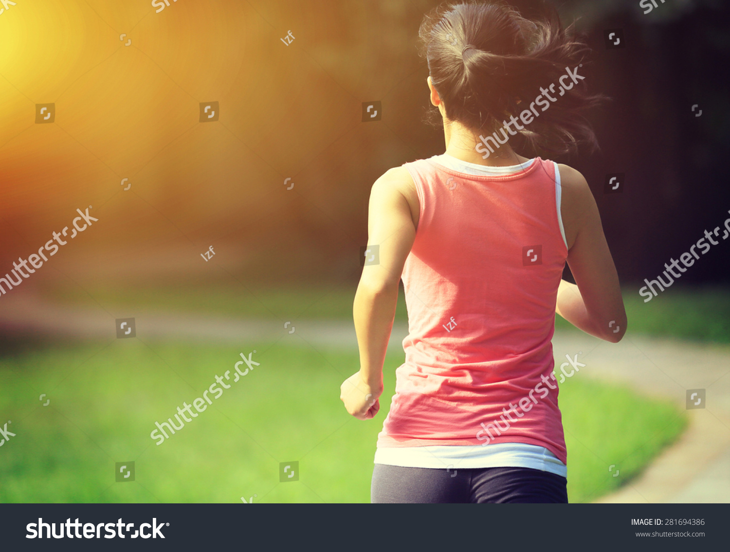 Runner Athlete Running At Park Trail. Woman Fitness Jogging Workout ...