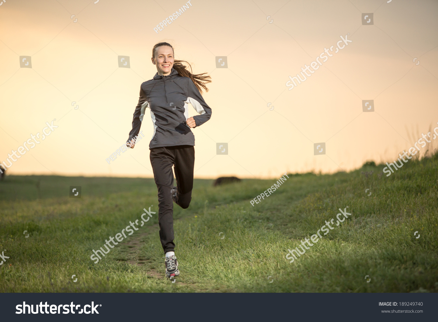 Running Woman Runner Jogging Over Sunset Stock Photo 189249740 ...