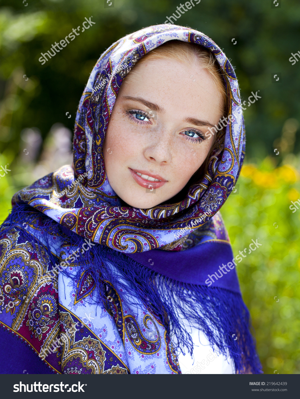 https://image.shutterstock.com/z/stock-photo-russian-beauty-woman-in-the-national-patterned-scarf-219642439.jpg
