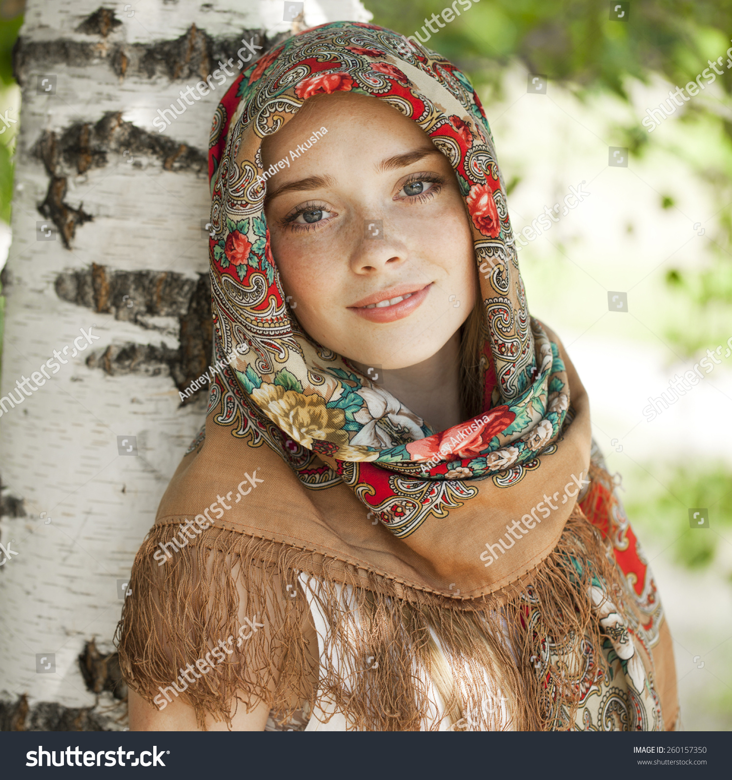 https://image.shutterstock.com/z/stock-photo-russian-beauty-woman-in-the-national-patterned-scarf-260157350.jpg
