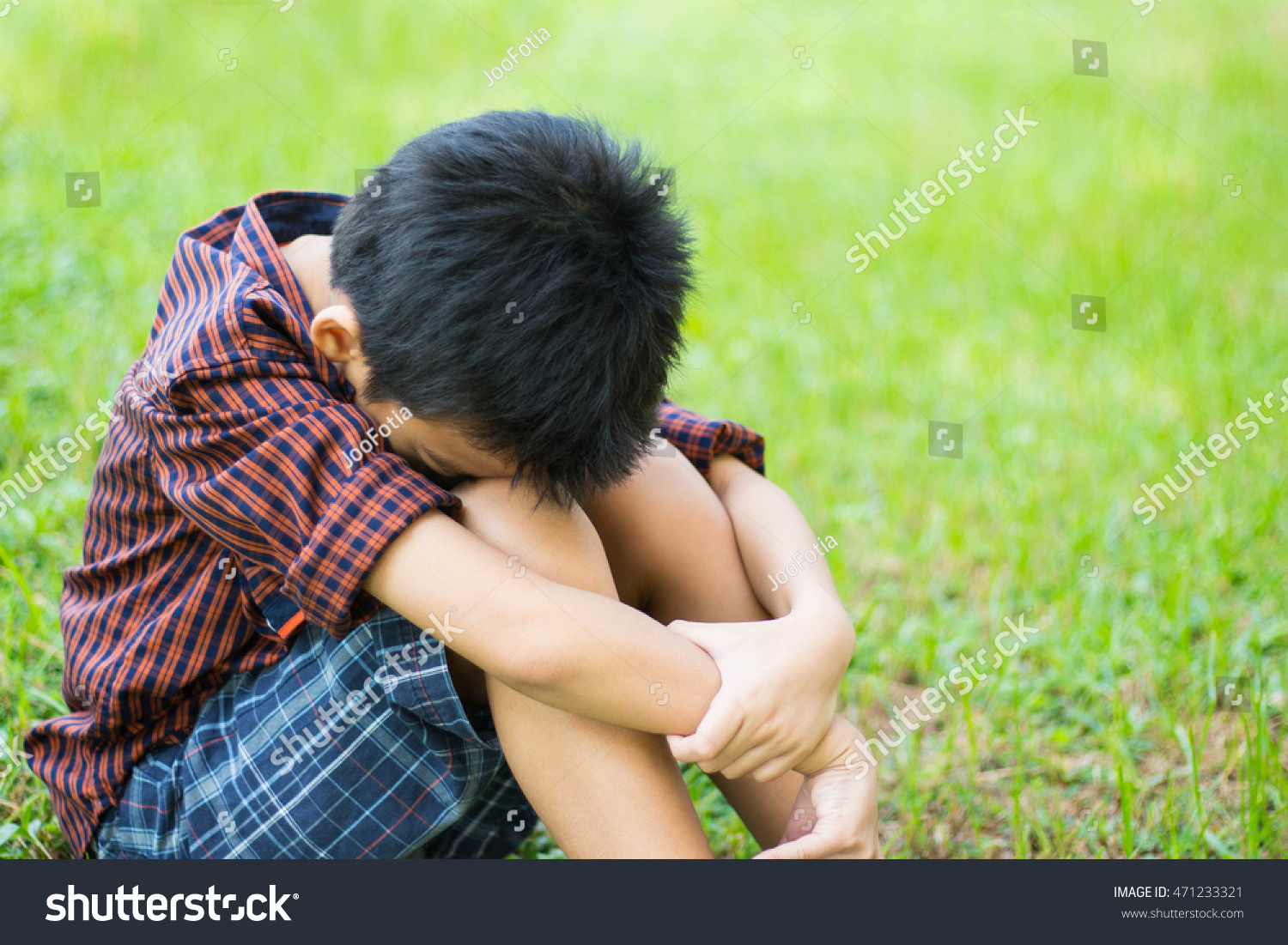 Sad Boy Sitting Alone On Meadow Stock Photo 471233321 - Shutterstock