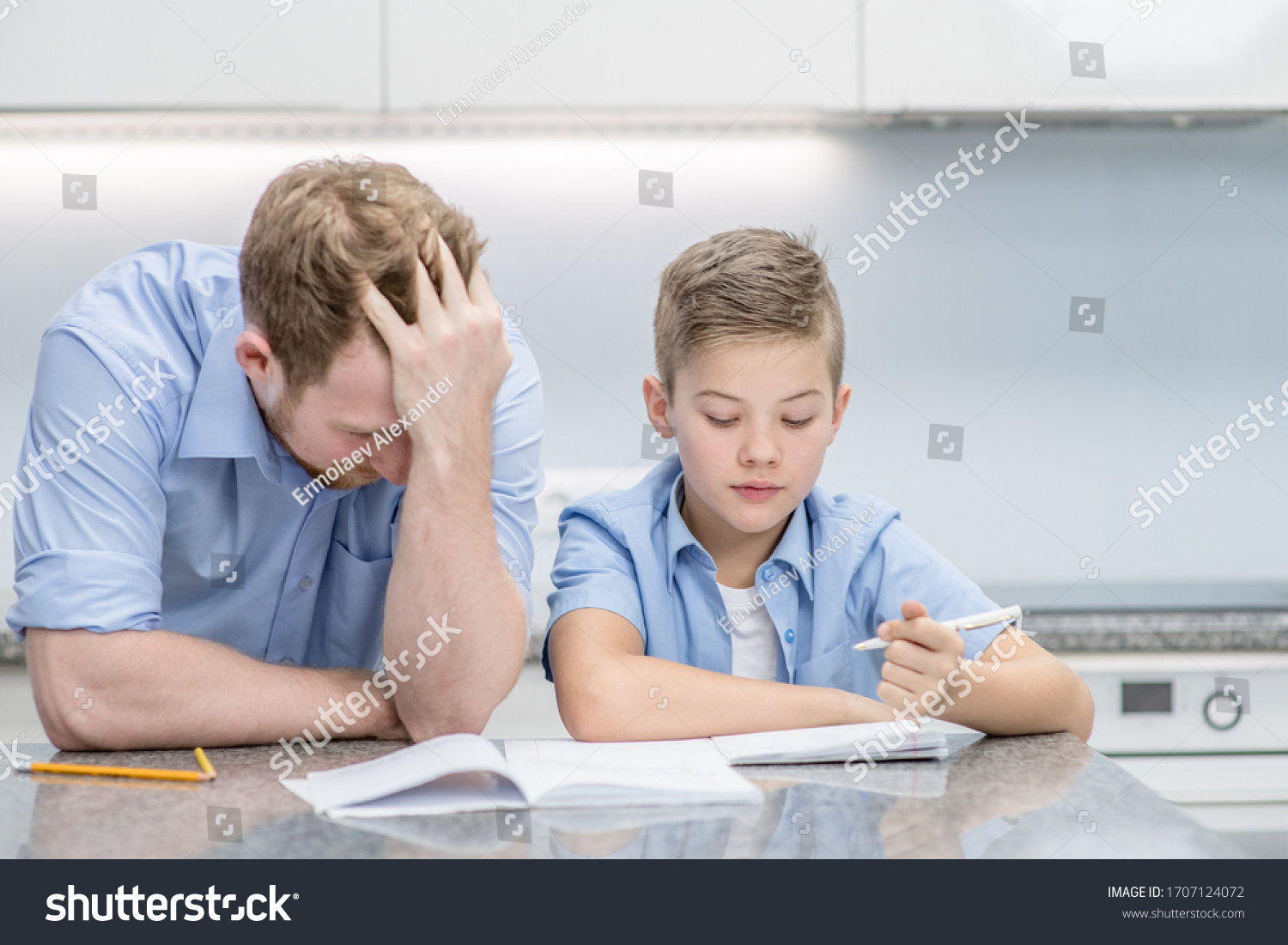 kid doing homework sad