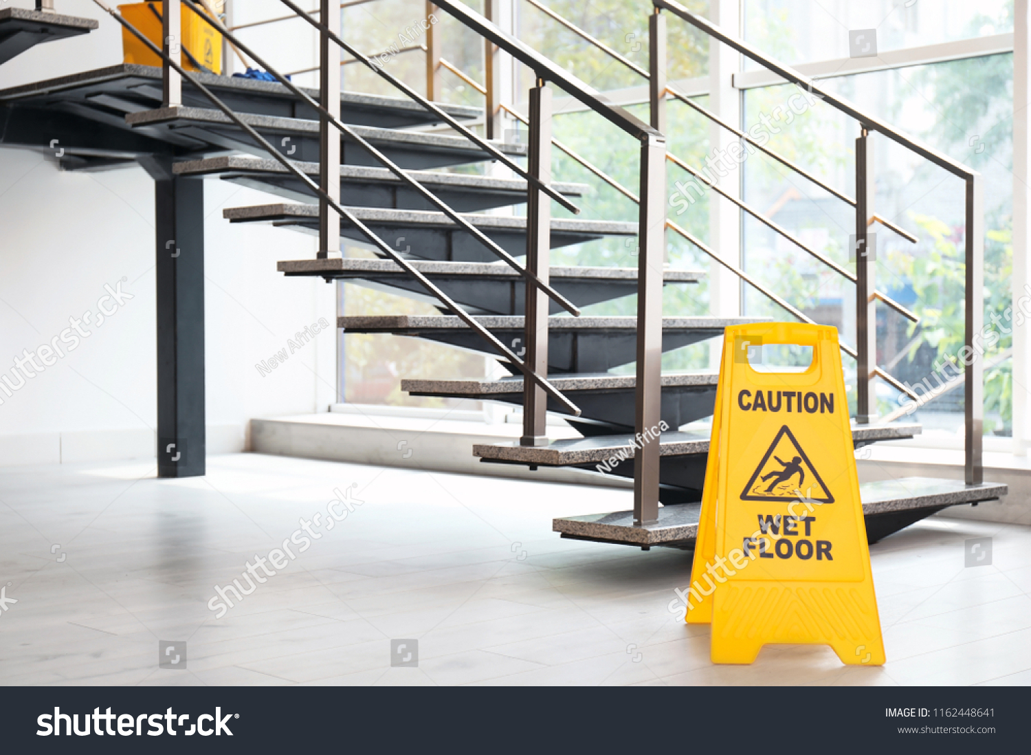 Safety Sign Phrase Caution Wet Floor Stock Photo (Edit Now) 1162448641